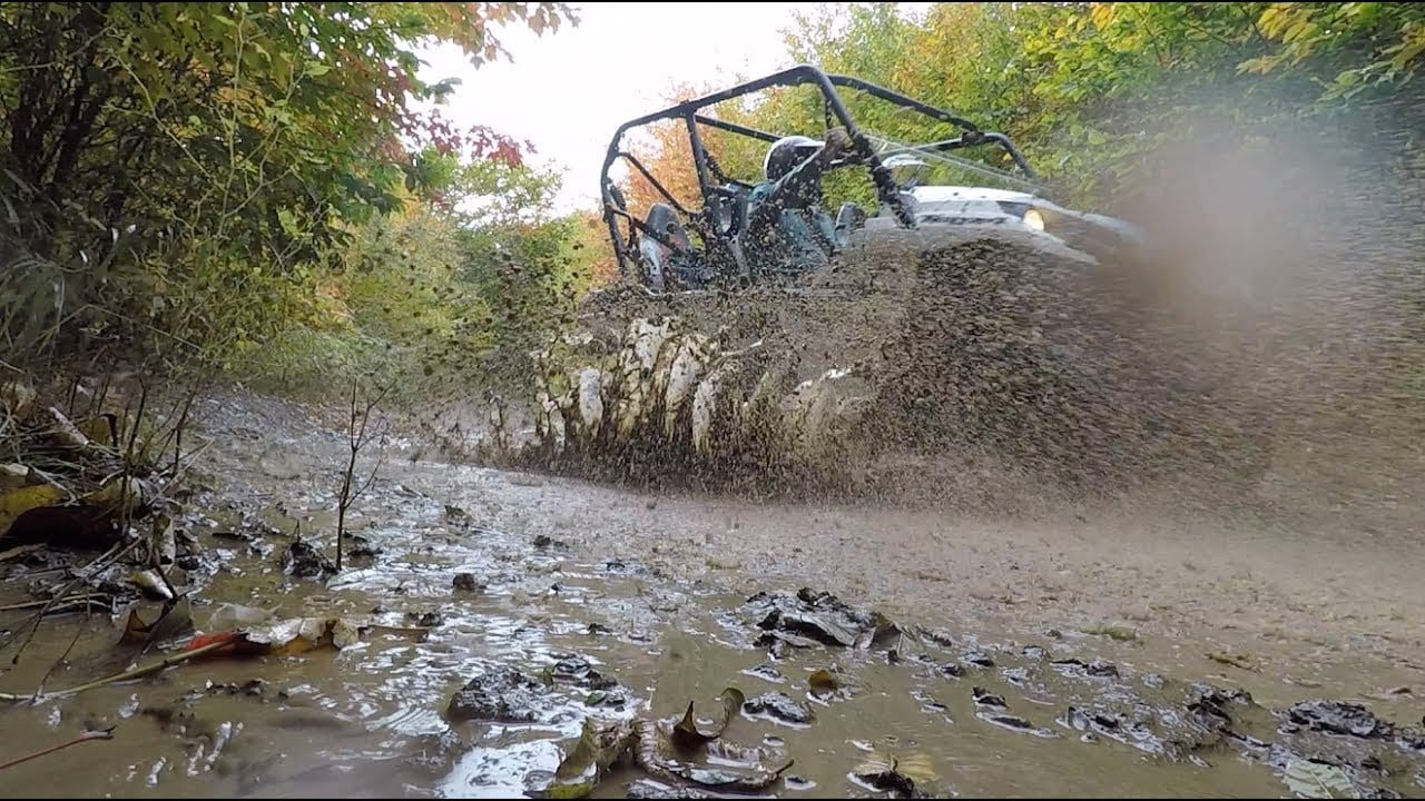 Muddy ATV at Cozy Knoll Cabins in Lincoln, Maine